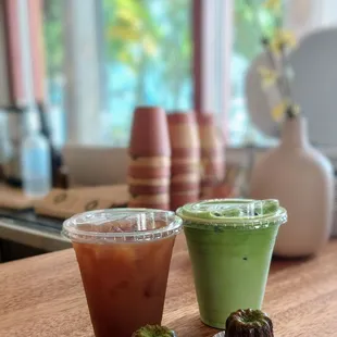 Cold brew with a splash of milk and an iced matcha latte