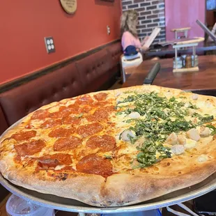 Half pepperoni pizza &amp; half Chelsea pizza