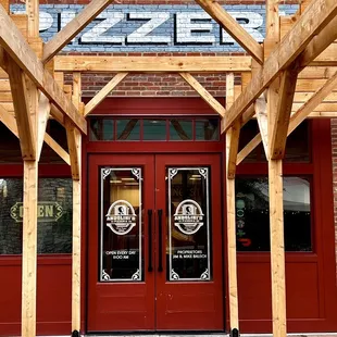 the entrance to the pizzeria