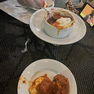 a plate of pasta and a bowl of lasagna
