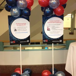 Use balloons to highlight signage.  We can provide both