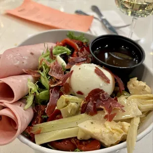 Everything but bread salad with a burrata ball!