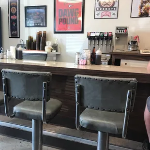 a woman sitting at the counter