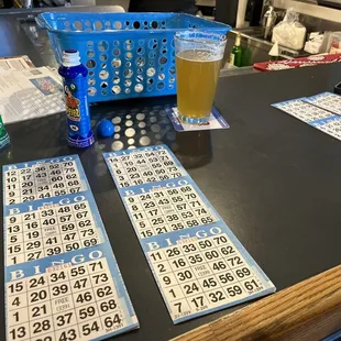 a table with a lottoons and a beer