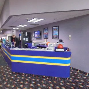 The main desk - shoes &amp; bowling balls.