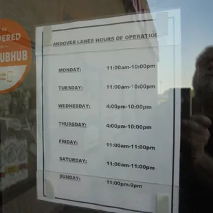 Hours of operation, main entry door.