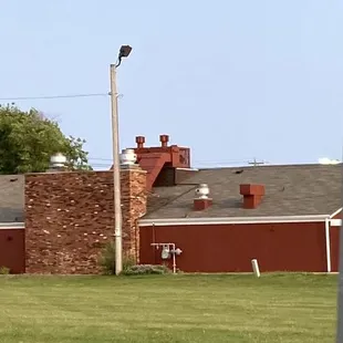 a view of the building from across the field