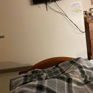 a bed with a blanket on it