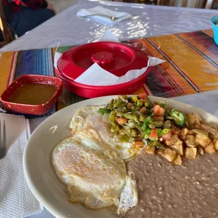 Nopalitos Huevos rancheros beans papas rancheros tortillas