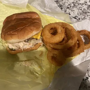 $16 Cheese burger and onion rings.