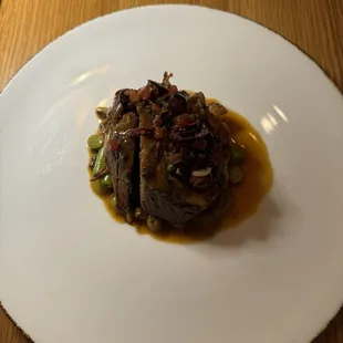 Braised coppa with beans