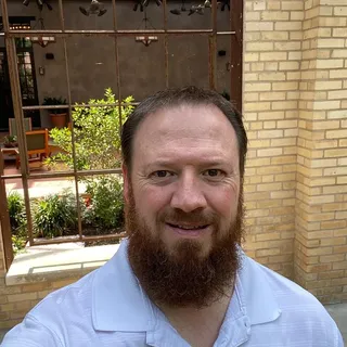 Curtis J.
