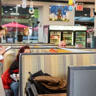 a woman reading a menu