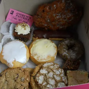 a variety of pastries in a box