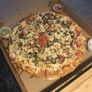 Large Margherita Pizza with extra sauce , anchovies, jalapeño and Gorgonzola