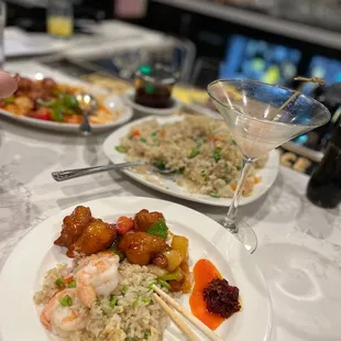 Shrimp fried rice, orange chicken and a beef dish!  All super yummy!  And steamed shrimp potstickers !