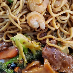 To go - mix of Hunan beef and shrimp lo mein.