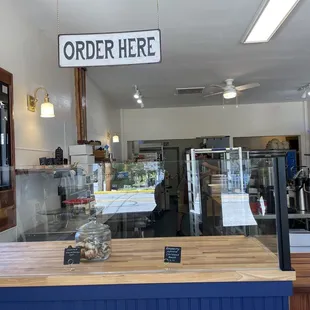 a sign that says order here