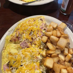 an omelet and potatoes