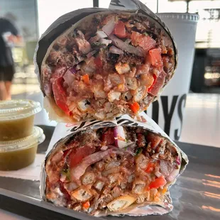 Come a little closer then you'll see  Gyro Burrito w/ rice &amp; beans from #andysburgers
