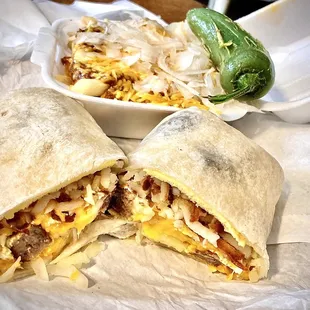 Sausage,egg,hashbrown &amp;cheese breakfast burrito &amp; chili-cheese fries w/onion &amp; jalapeño. Great.