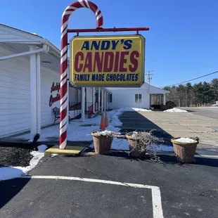 candy cane in front of candy cane sign