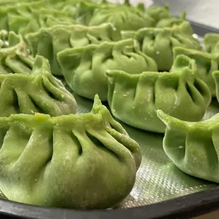 a tray of dumplings