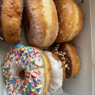Half dozen random selection of donuts