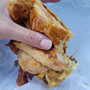 Egg, bacon and cheese on a crossiant. So amazing!! $7. They don&apos;t hold back on the bacon!  Croissant with Bacon, Egg, &amp; Cheese
