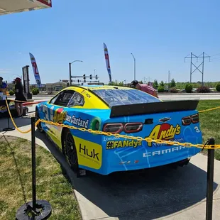 a blue and yellow car