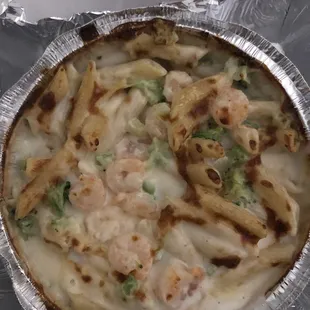 Tiny shrimp and broccoli in the shrimp Alfredo.