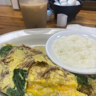Brisket &amp; Spinach Omelette with grits.