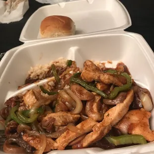 chicken fajita platter with rice underneath and a roll. Yum!