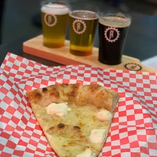 a slice of pizza on a tray