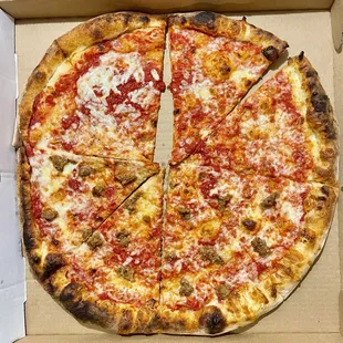 Half cheese half sausage pizza