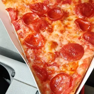 Slice of pepperoni pizza