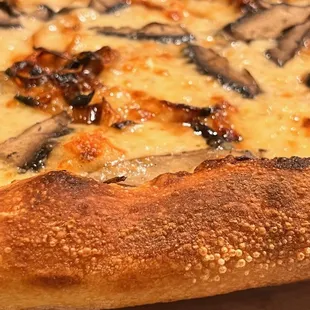 a closeup of a pizza