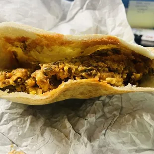 Taste better then it looks sausage egg hashbrown pita.