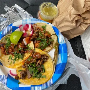 One taco of each- pastor, chicken, beef. Chips and salsa included.