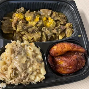 Curry goat, jerk Mac and plantain