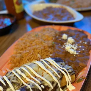 For as long as this took to come out I would have thought the cheese would have been melted.  Enchiladas poblanos.