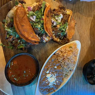 Birriaqueso tacos with rice and beans