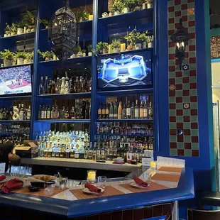 a bar with a blue counter