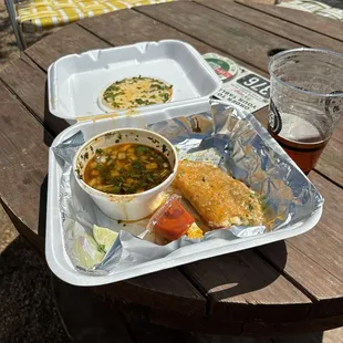 Burria Tacos and super delicious consume at the Truck Yard