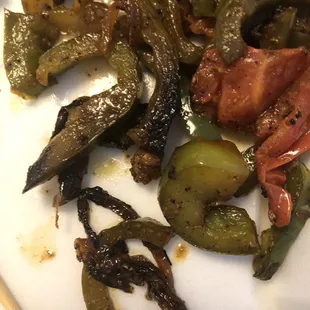 :-( too many burnt pieces under the meat.