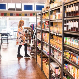 a woman shopping in a grocery store
