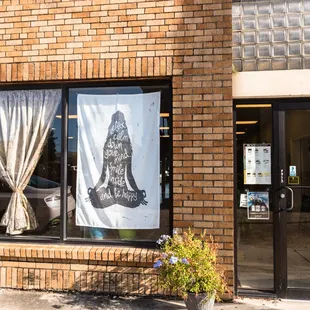 a brick building with a large window