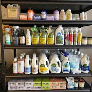 a shelf full of cleaning products