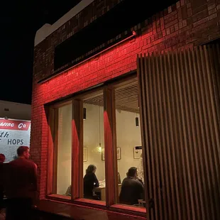 Small alley to left of building where you can try to park