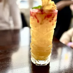 a close up of a drink on a table
